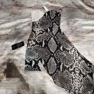 Bebe dress size M, beautiful, never worn